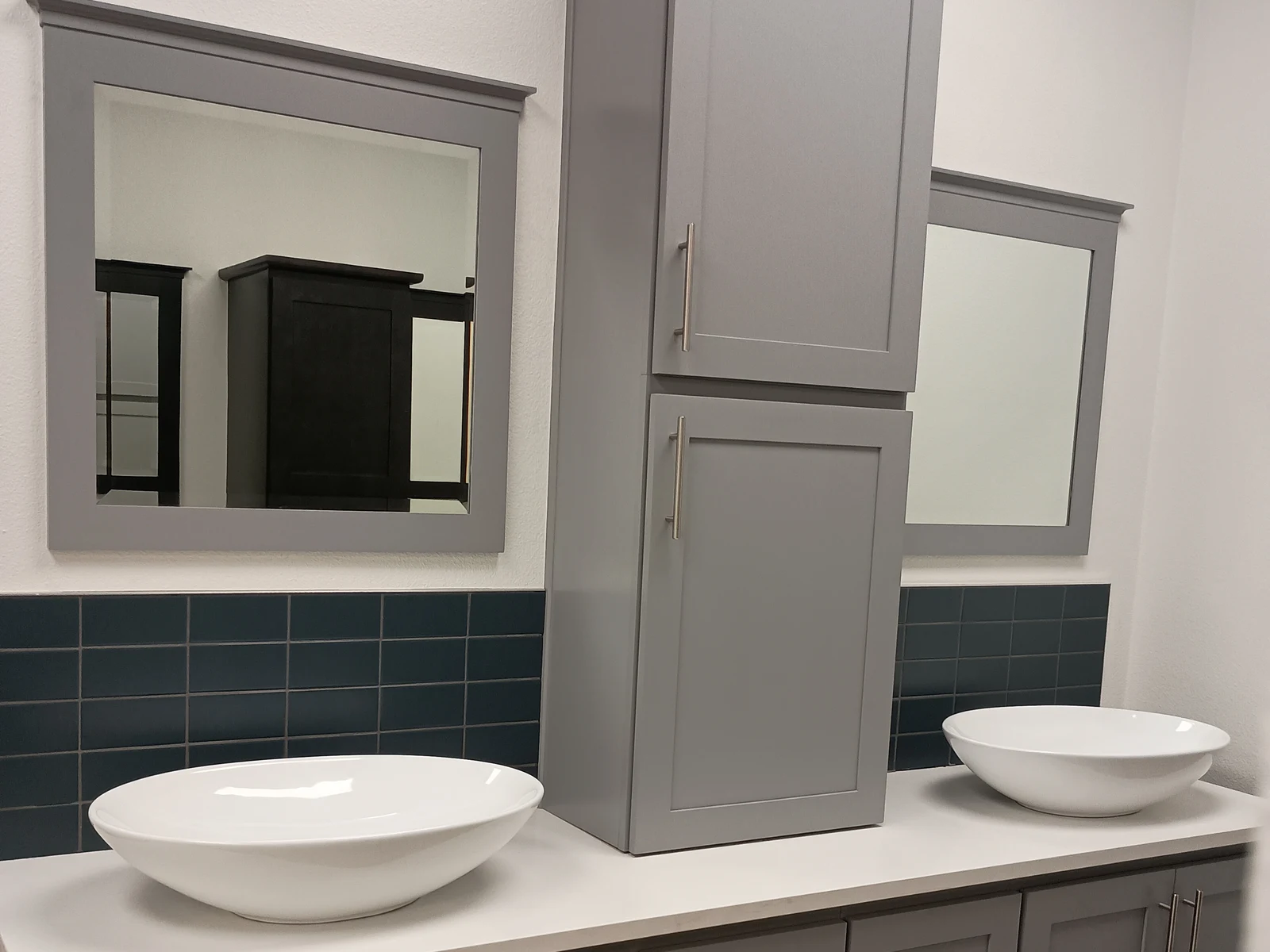Gray shaker double bathroom vanity with vessel sinks