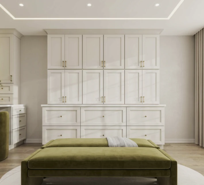 Shaker White built-in cabinetry wall with brass hardware