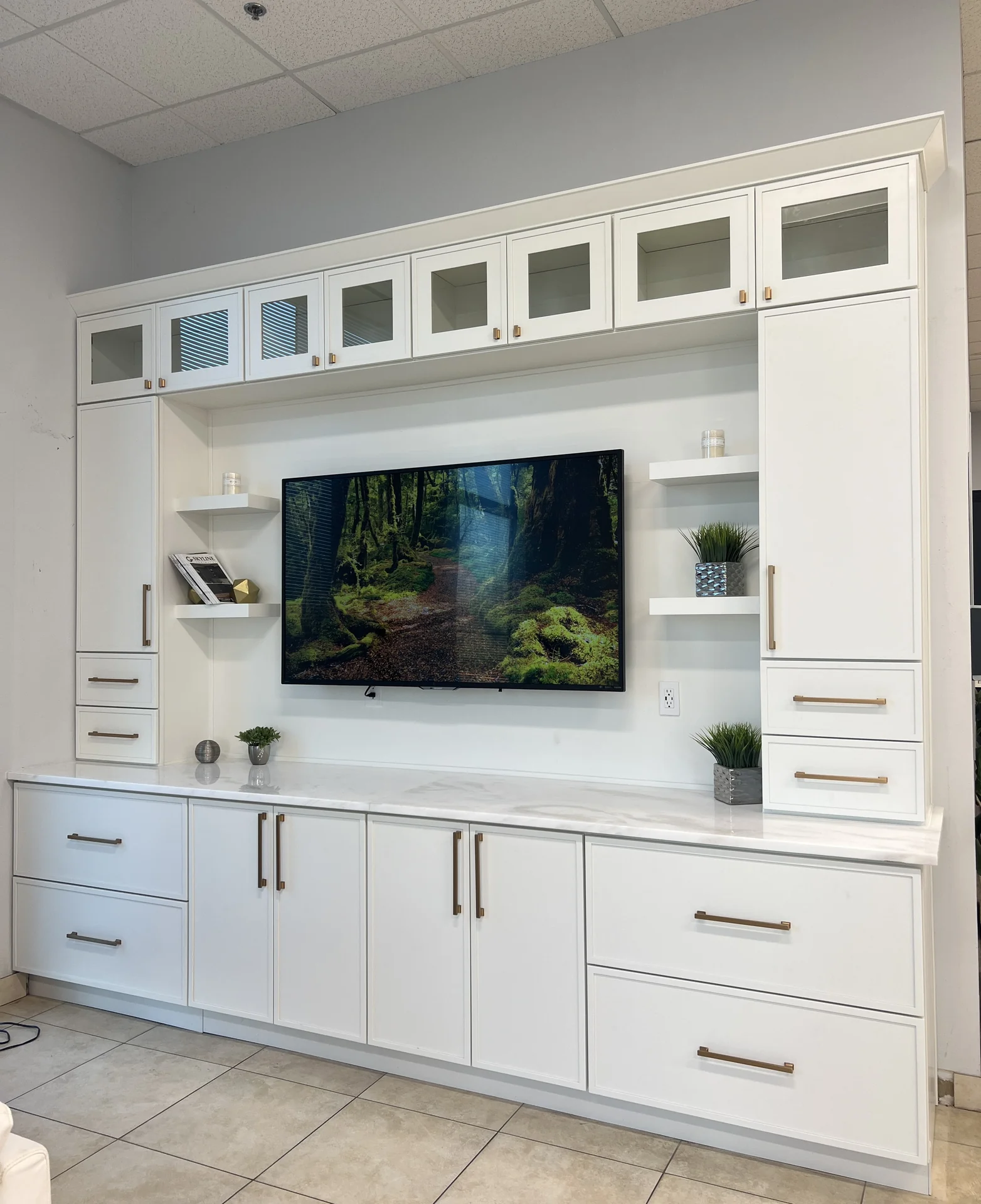White slim shaker built-in cabinetry with glass upper doors
